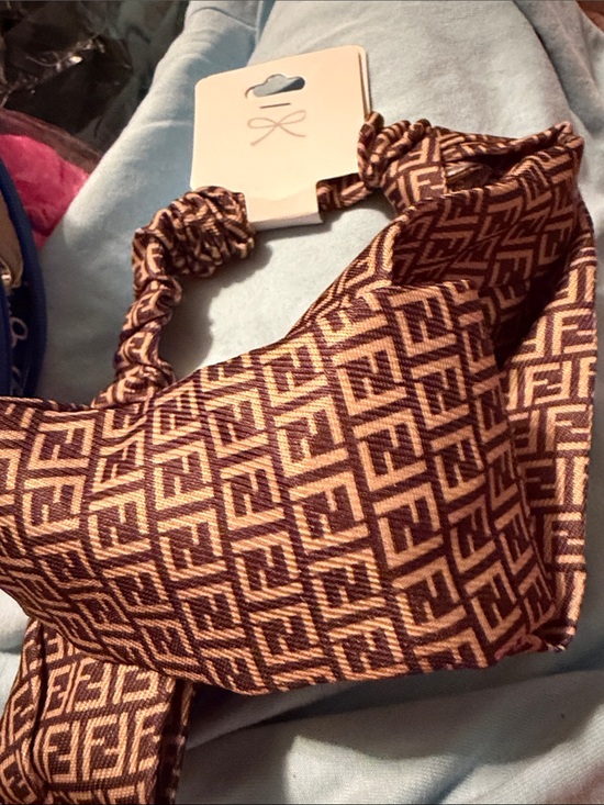 Cosmetic bag with hair accessories main image 5